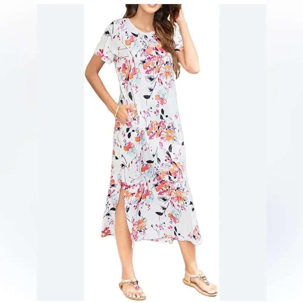 New with tag Naggoo Floral Maxi Dress with Pockets and side slits size L.